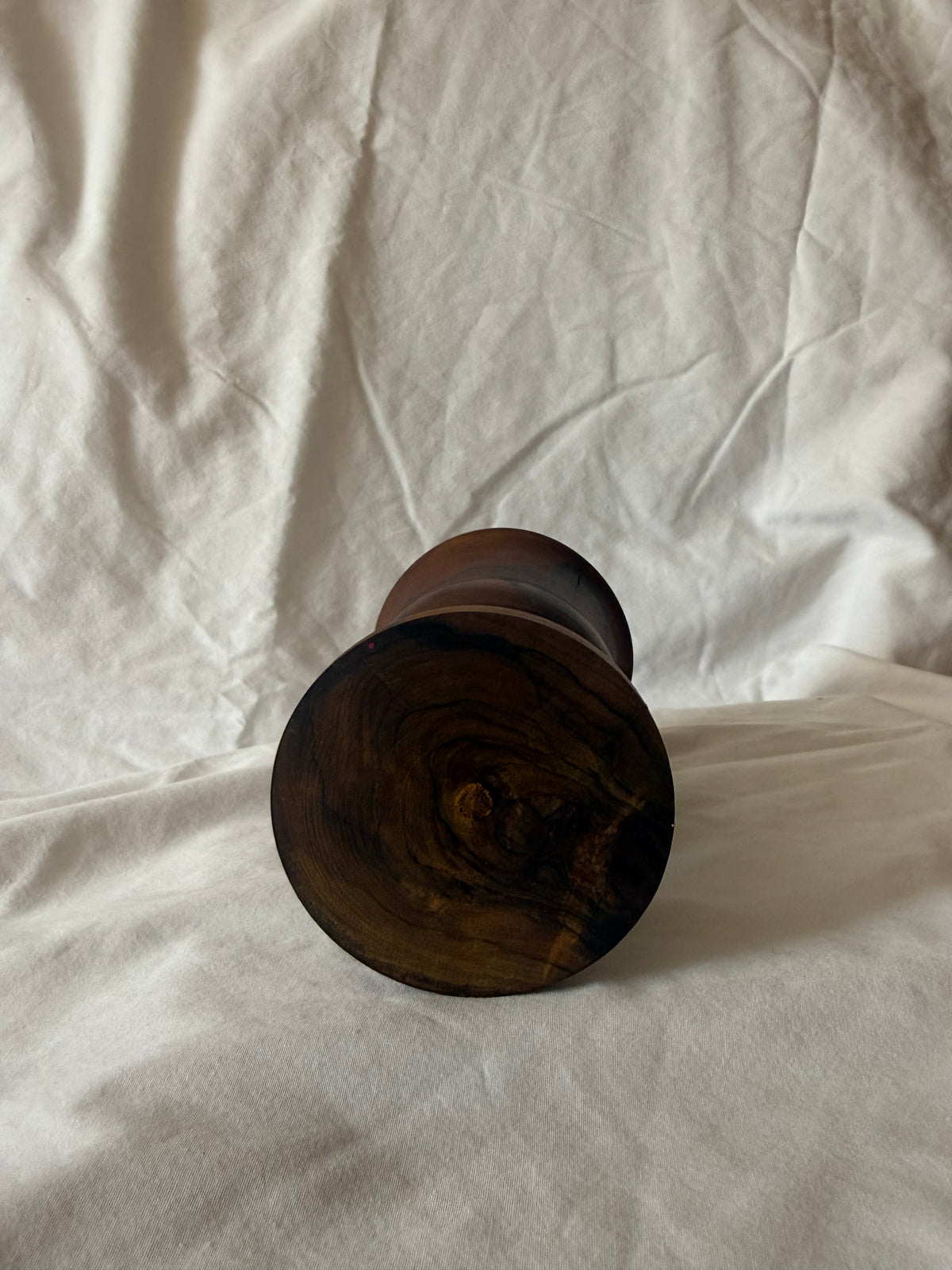 Base of turned wood goblet vase