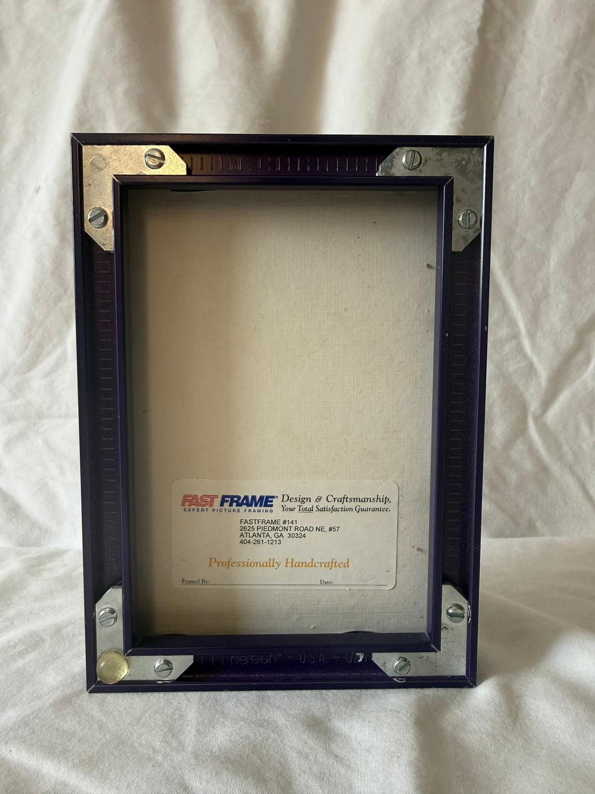 Back of frame with Fast Frame Atlanta label