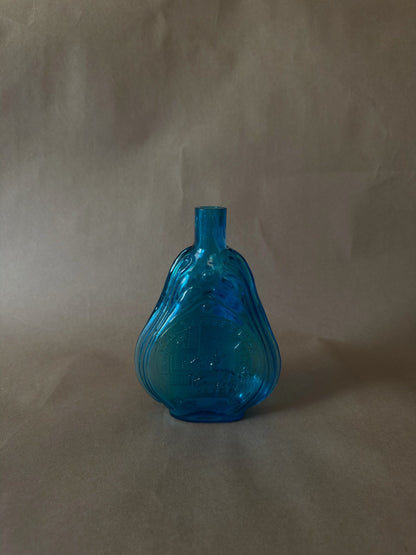 Vintage Embossed Figural Glass Flask