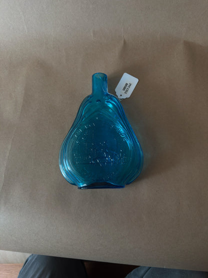Vintage Embossed Figural Glass Flask