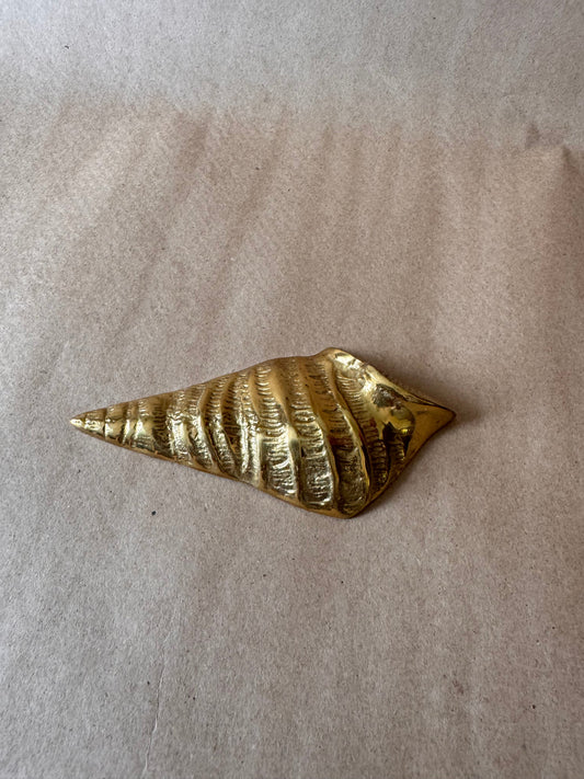 Cast brass shell wall hanging with ridged spiral detail