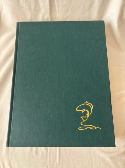 Green cloth front board with gilt fish