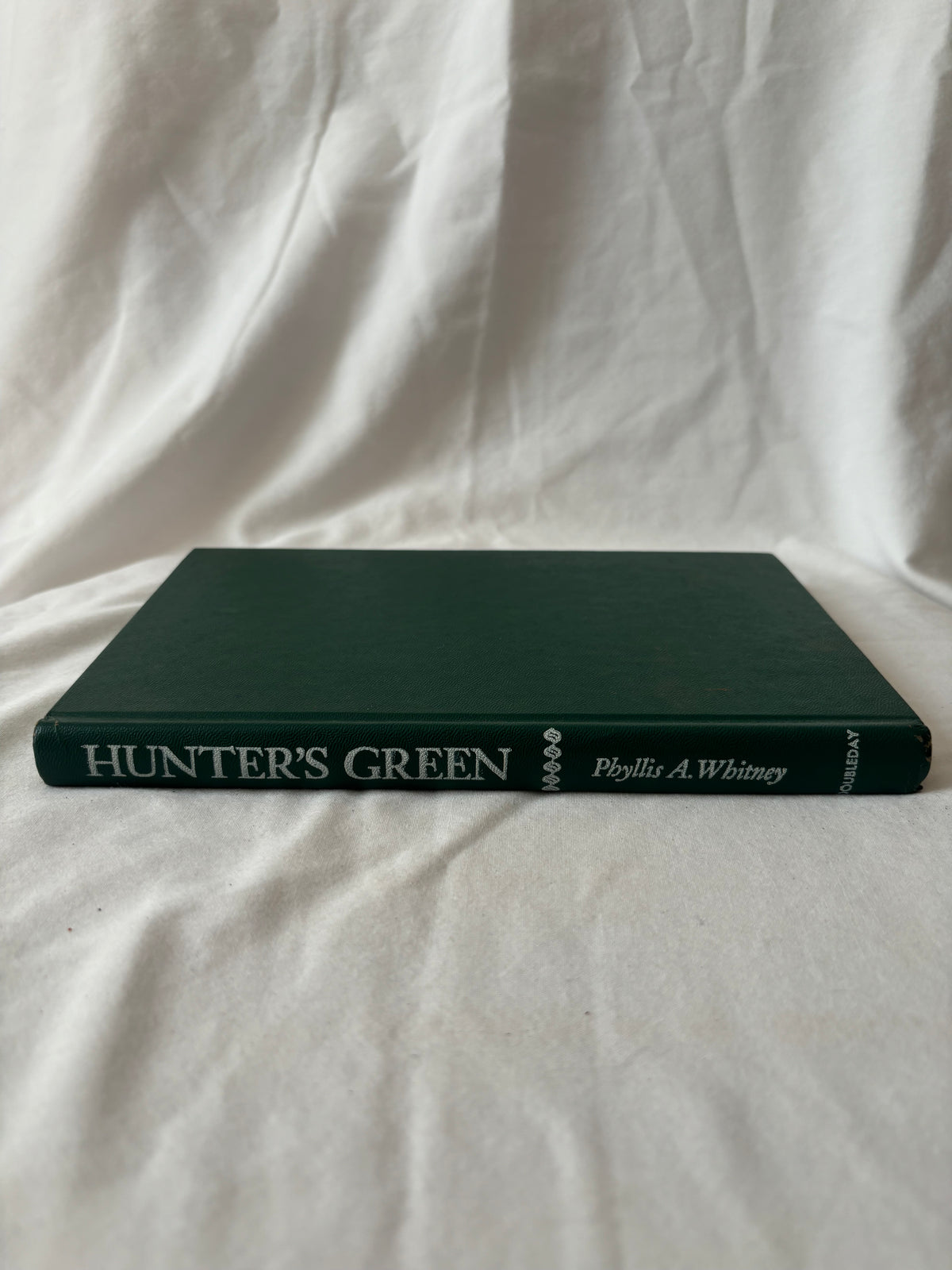 Hunter's Green spine, green boards with silver lettering
