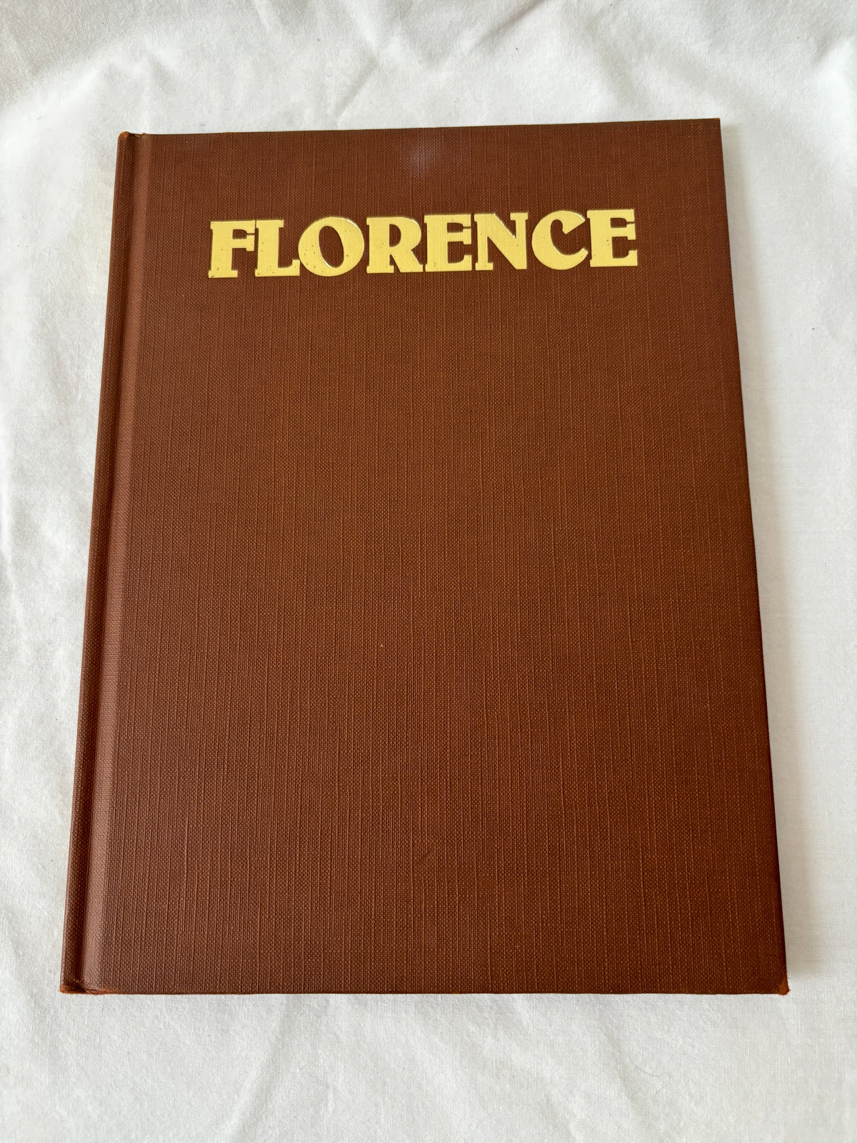 Florence, brown cloth cover with gilt lettering