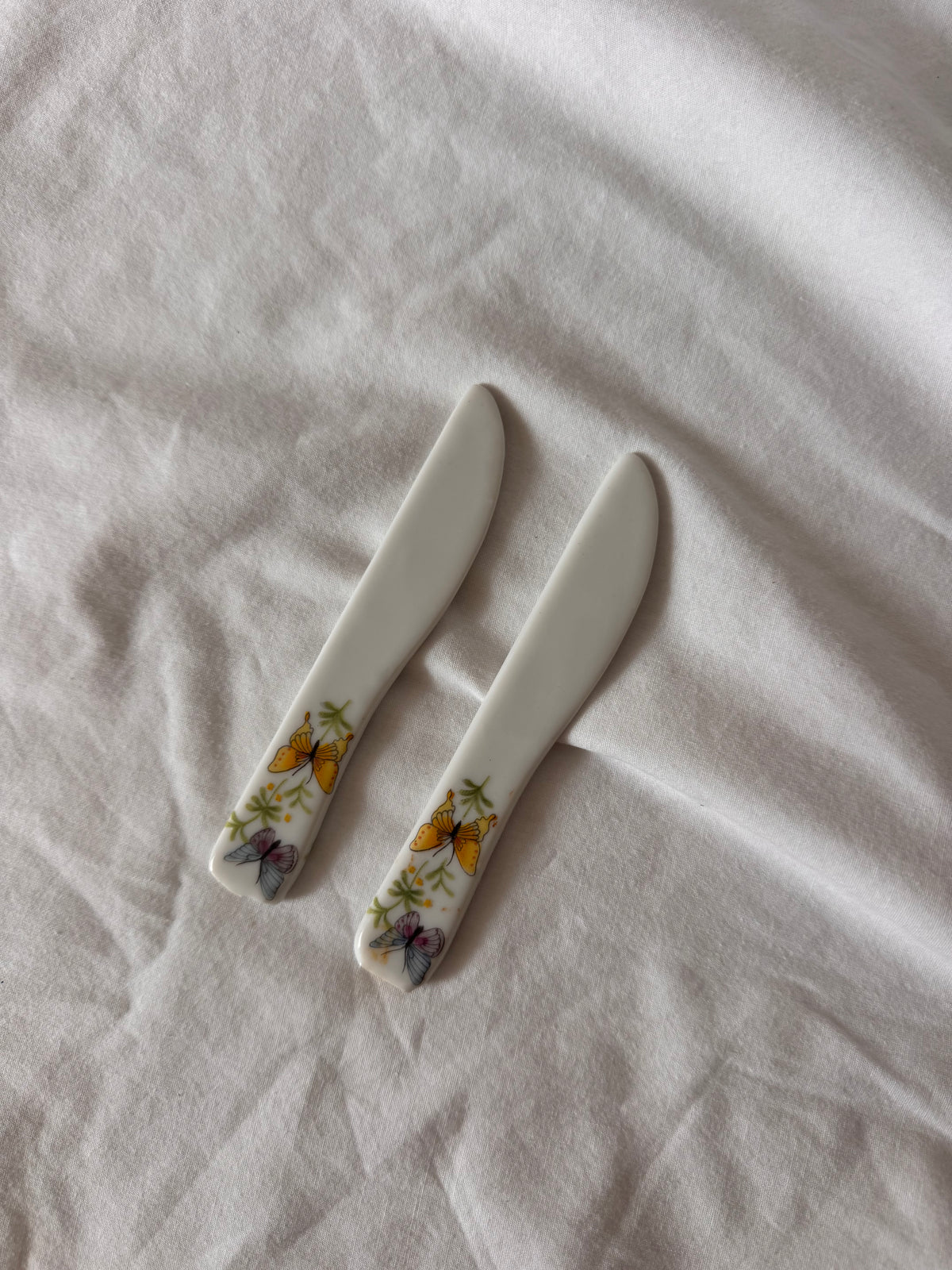 Porcelain Butterfly Spreaders, Pair