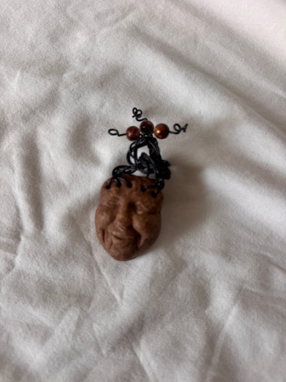 Hand-Sculpted Face Brooch with Wire Hair