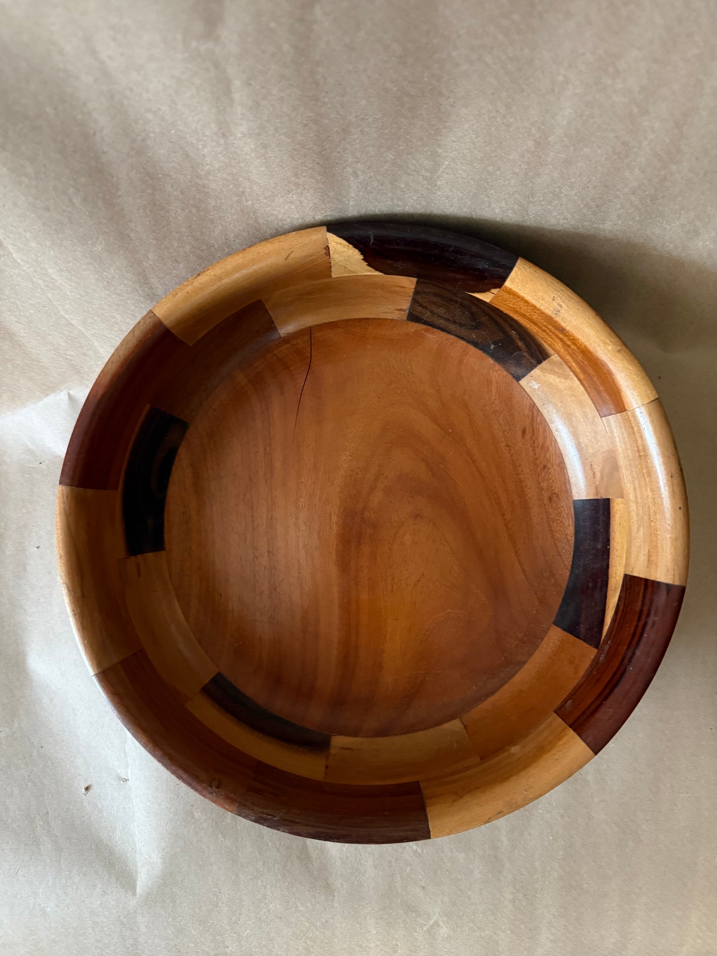 Segmented turned wood bowl in cherry, walnut and maple