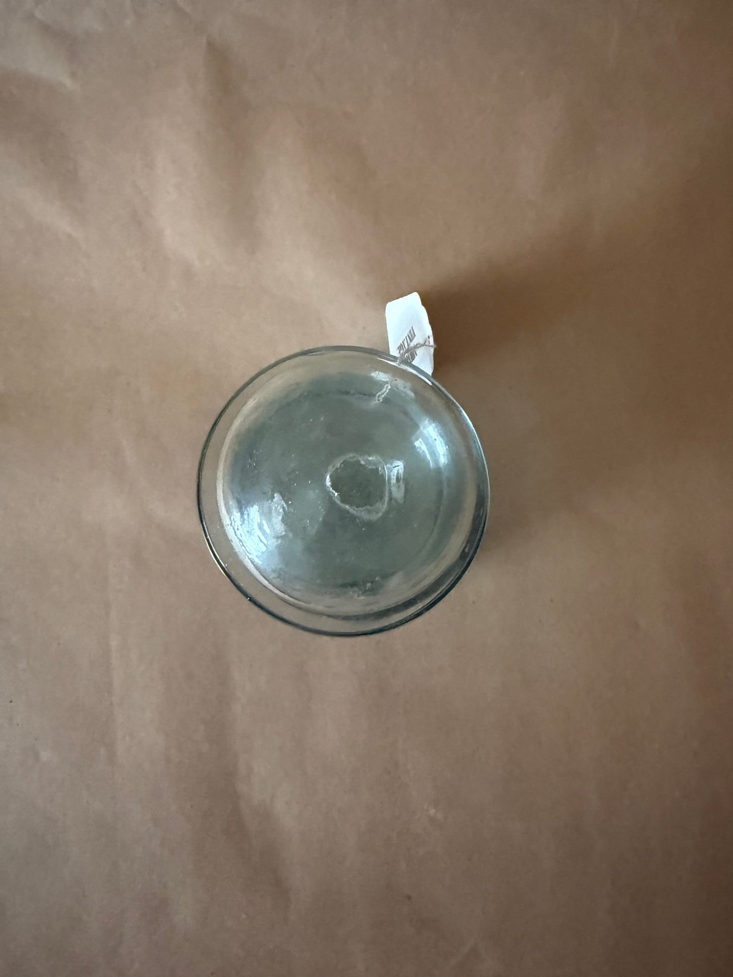 Overhead view of the aqua glass jar closed