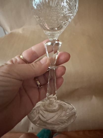 Detail of the faceted knop stem and starburst-cut foot
