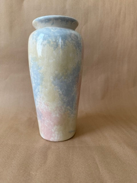 Slim ceramic vase in mottled cream, blue and pink pastel glaze