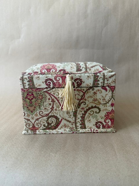 Fabric-covered keepsake box in rose and sage paisley with a cream tassel
