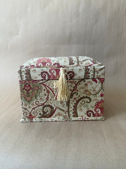 Fabric-covered keepsake box in rose and sage paisley with a cream tassel