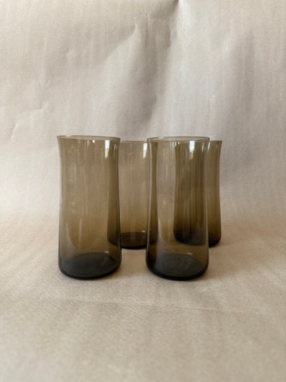Set of four tall smoked brown glass tumblers