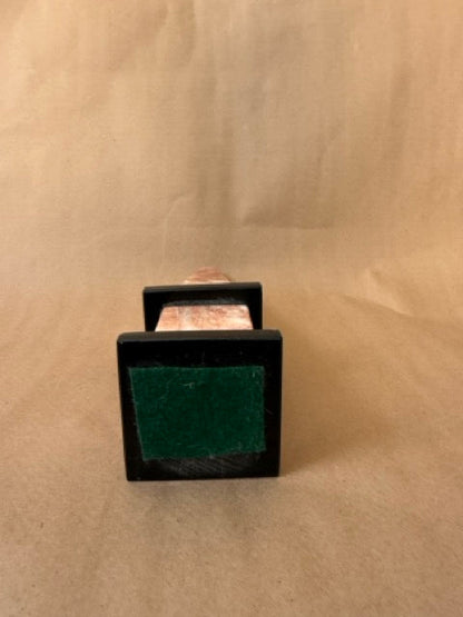 Obelisk, felted underside of base