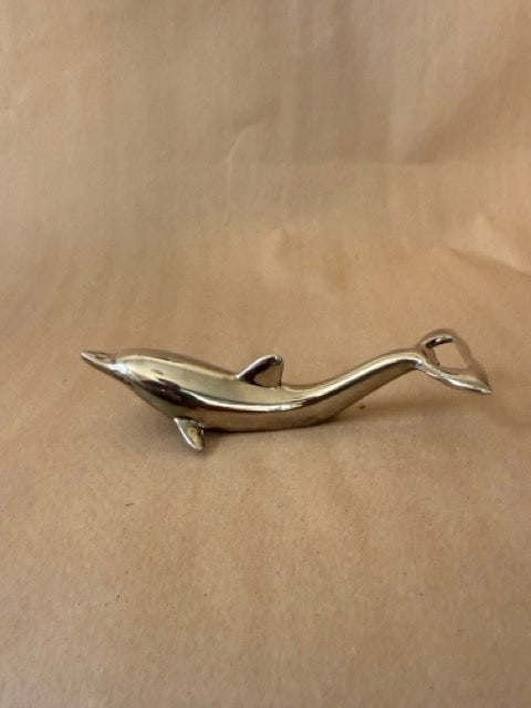 Dolphin opener, showing the opener in the tail
