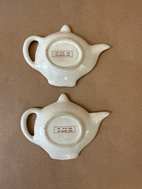 Both tea bag rests, reverse with marks