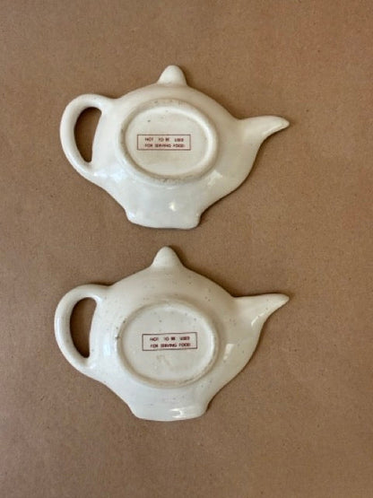 Both tea bag rests, reverse with marks