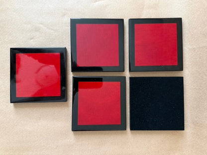 Black lacquer coasters with red centers