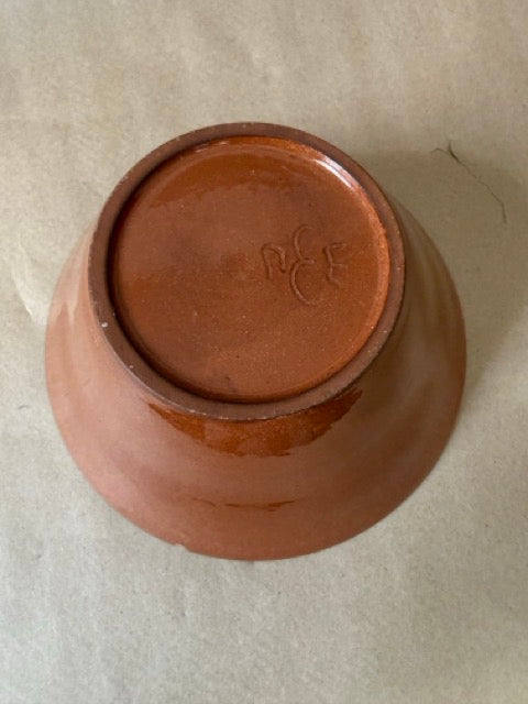 Incised initials on the foot