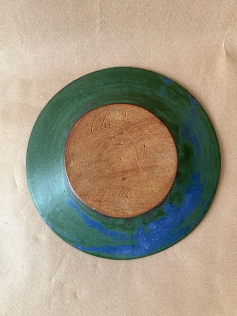 Artist's signature and 2006 date on the base