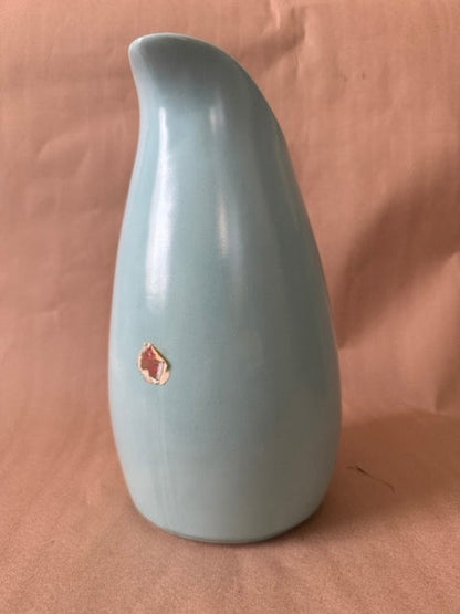 Pitcher reverse with partial foil label