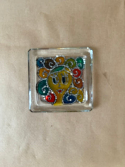 Reverse-painted glass dish with swirling hair