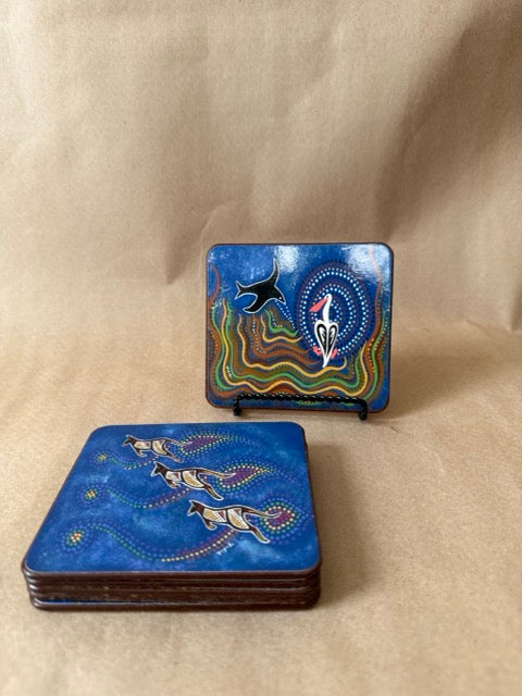 Coasters stacked with one displayed