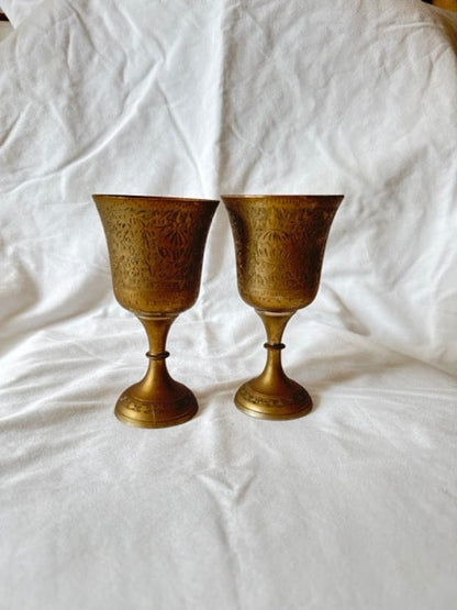 Pair of etched brass goblets, India