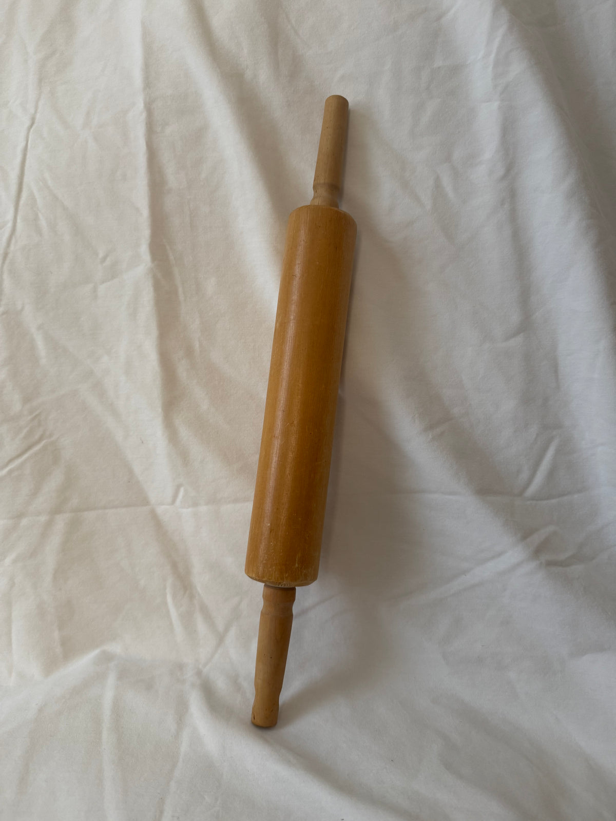 Wooden rolling pin, upright