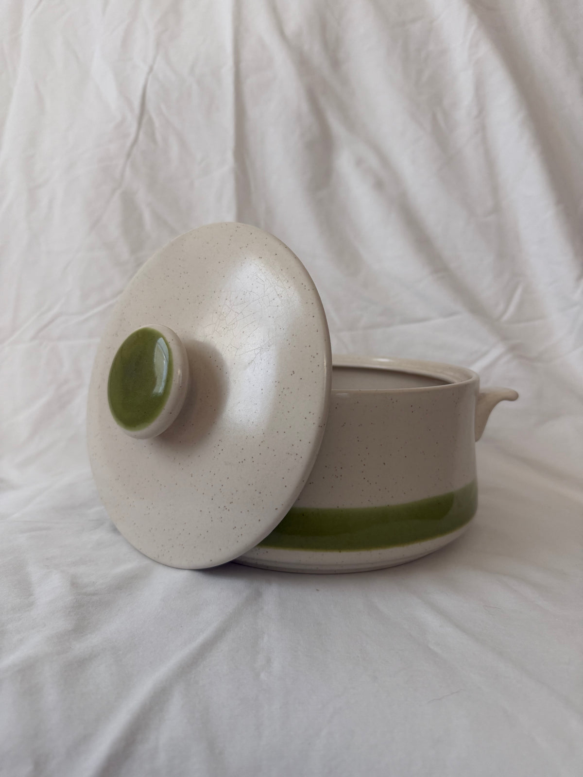 Casserole with lid tipped open