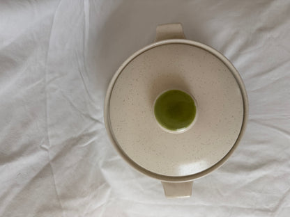 Casserole from above with green knob