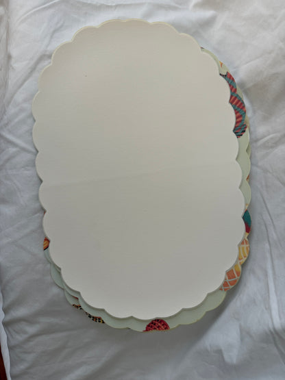 Cream backs of placemats, stacked