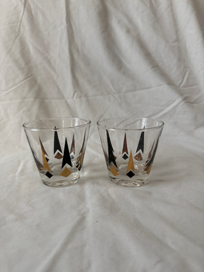 Pair of black and gold starburst rocks glasses