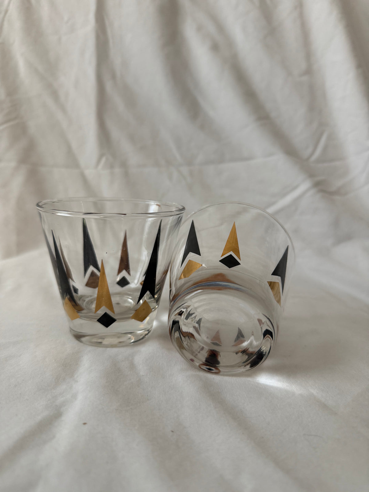 One glass on its side