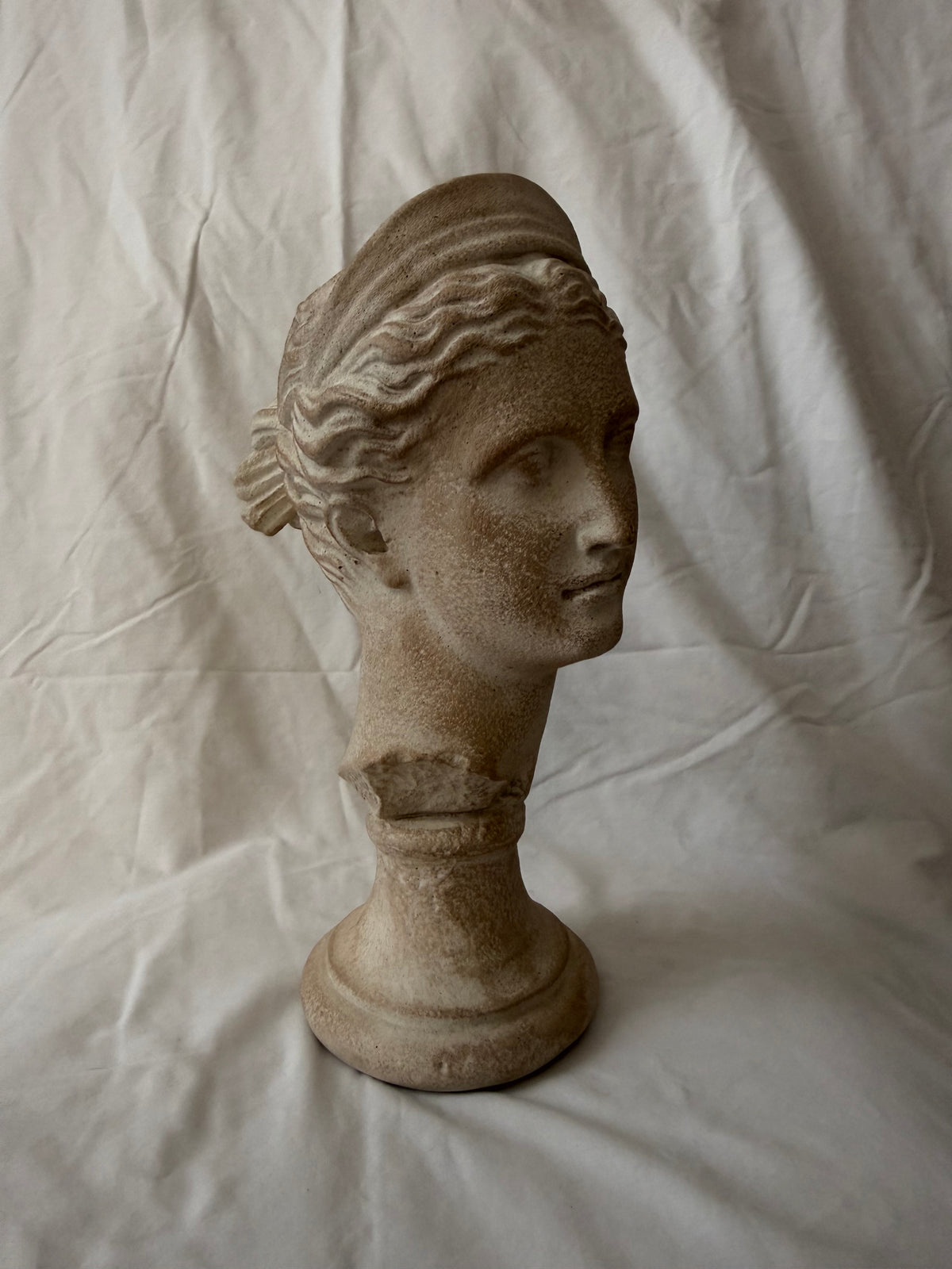 Goddess head, three-quarter view