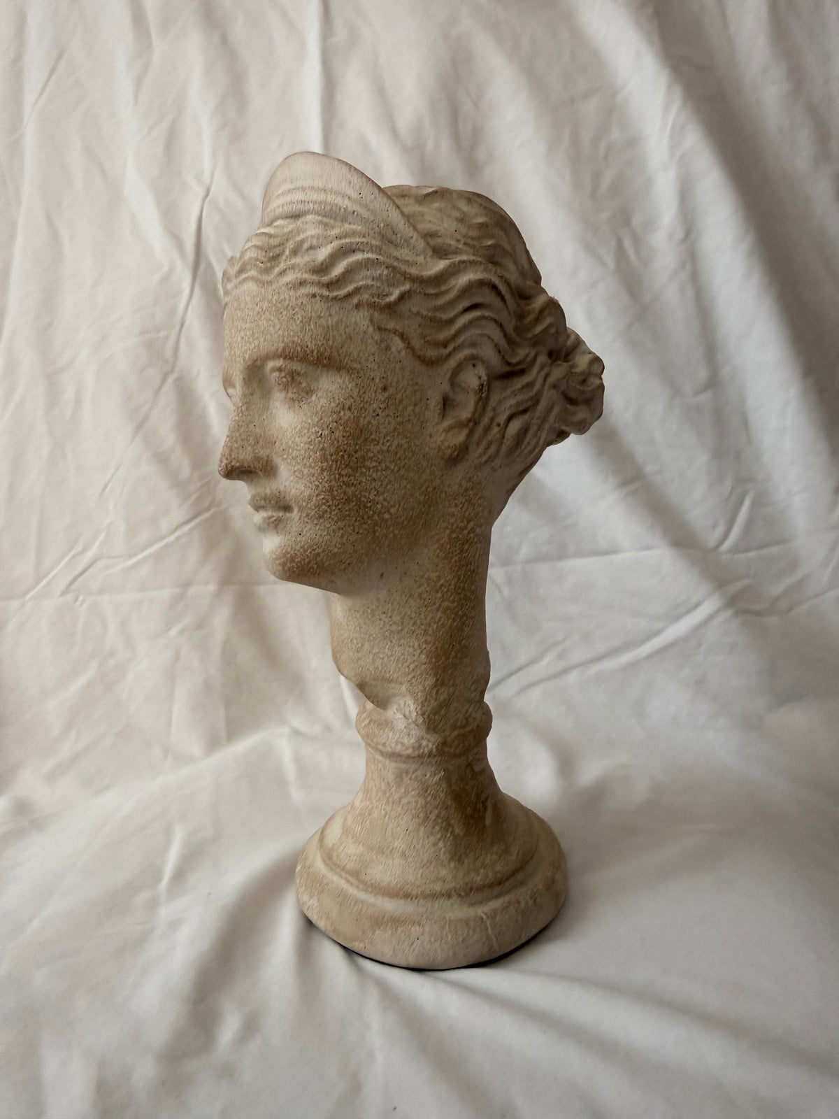 Goddess head, left profile