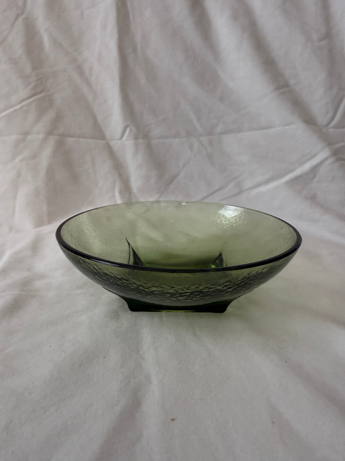 Single green bowl, side view