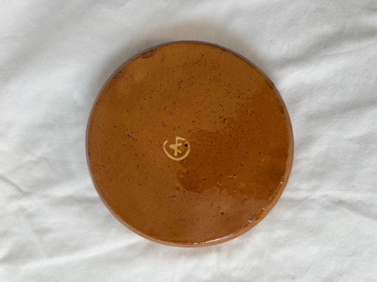 Underside of tray with foil label remnant