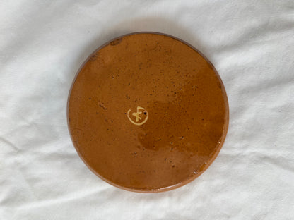 Underside of tray with foil label remnant