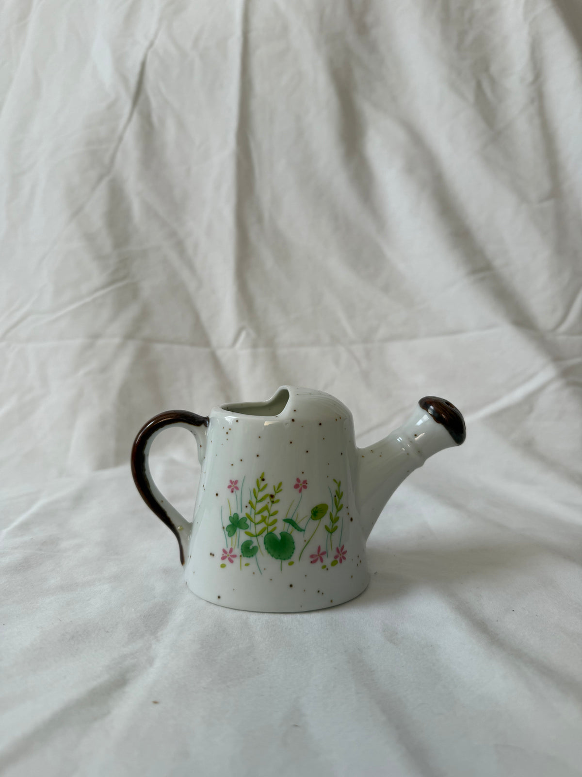 Watering can, other side