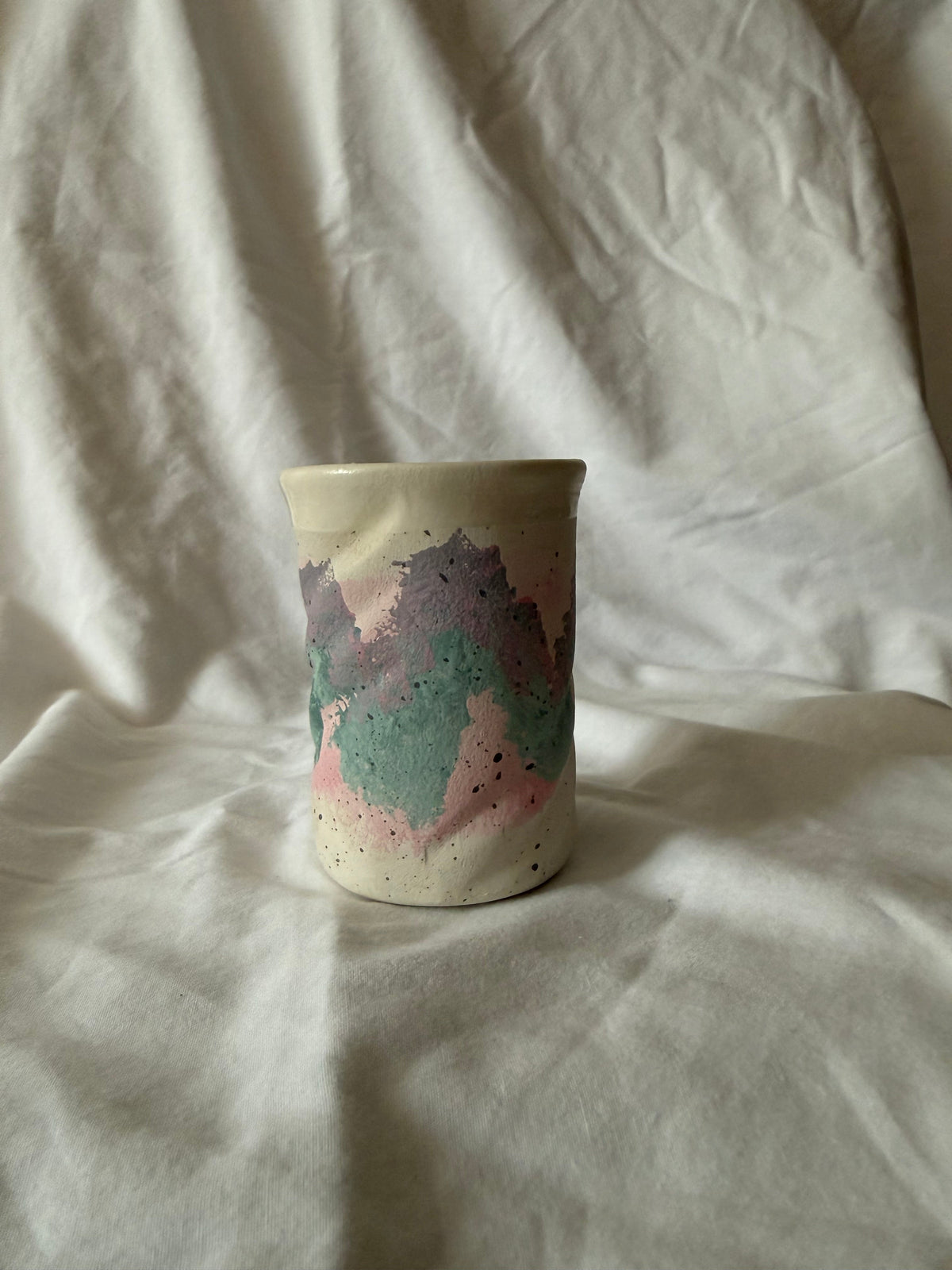 Other side of the pastel pottery tumbler