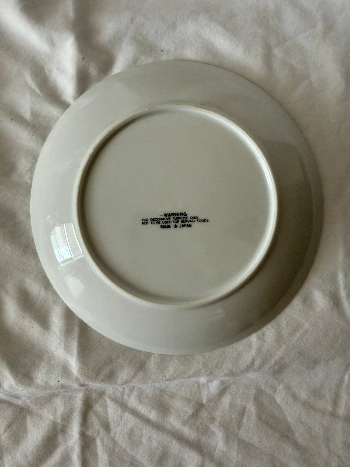 Back of the plate marked Made in Japan, decorative use only