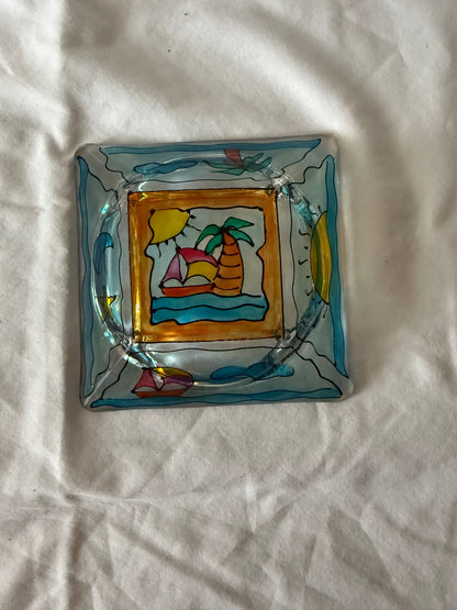 Angled view of the hand-painted glass ashtray