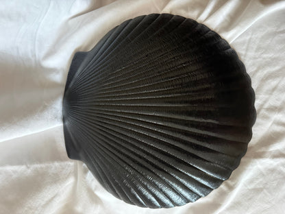 Ribbed underside of the black glass shell dish