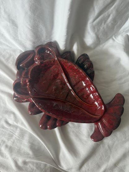 Red glazed ceramic fish wall pocket