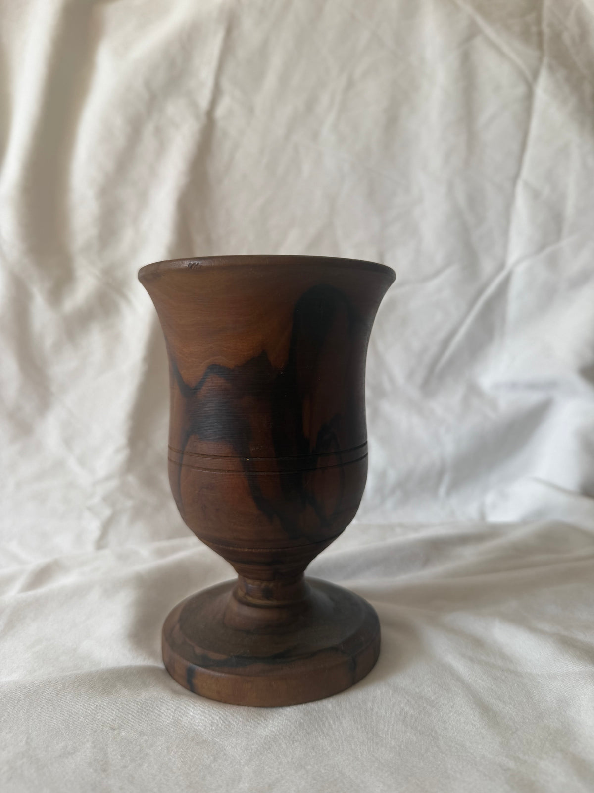 Turned wood goblet vase, reverse side showing grain