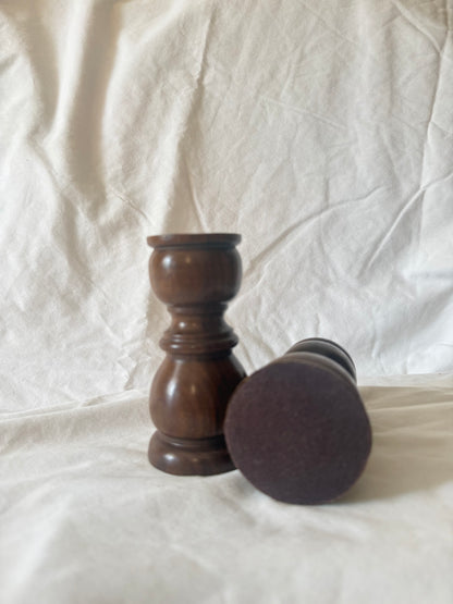 Felt base of turned wood candle holder