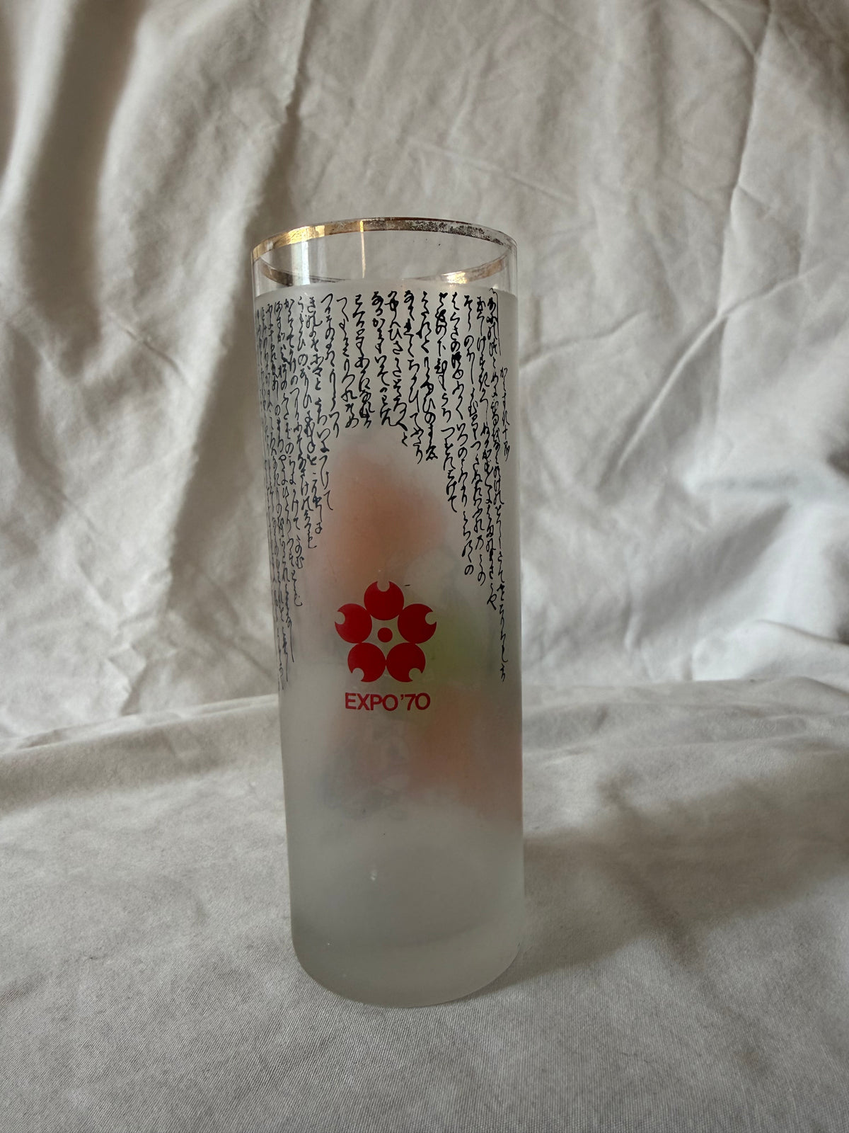 Expo '70 cherry blossom logo on frosted highball glass