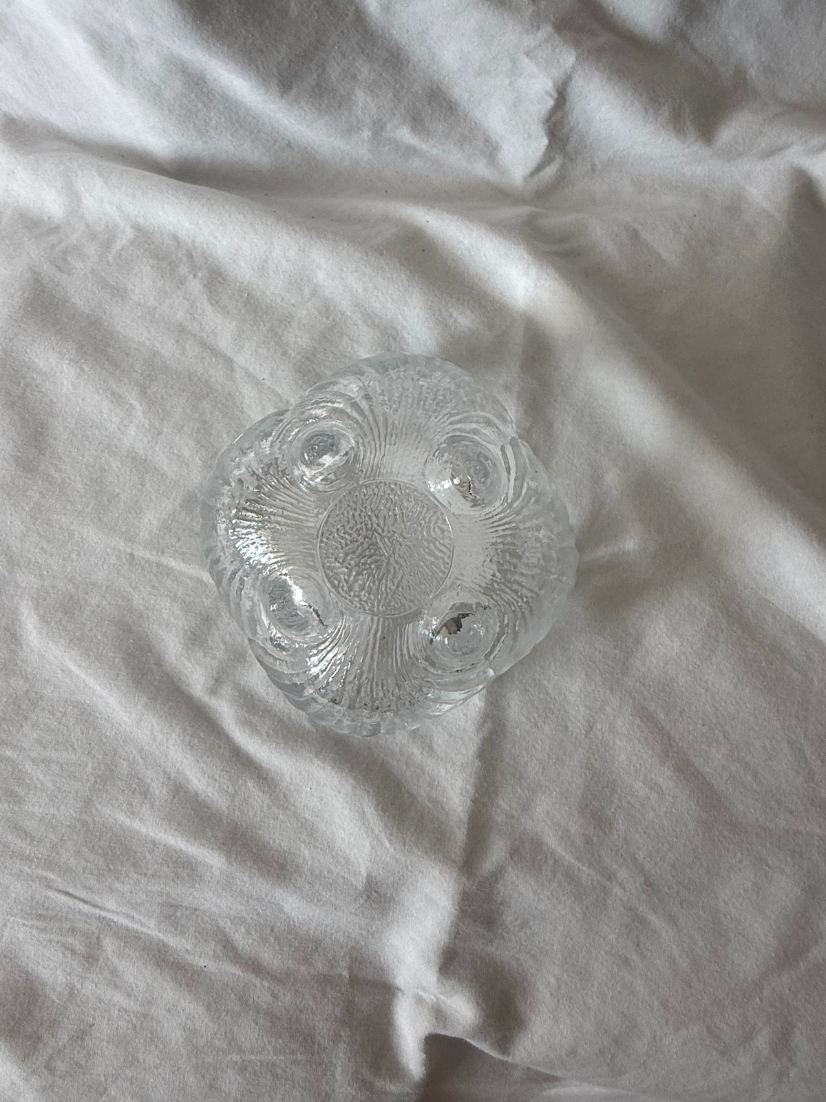 Underside of Viking glass shell dish showing feet