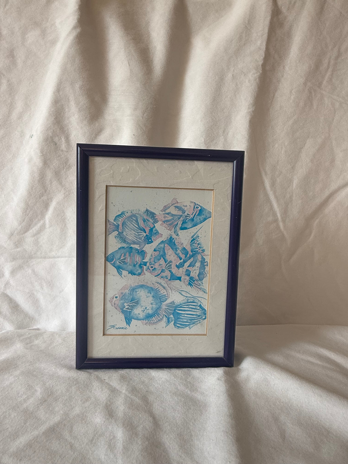 Framed blue tropical fish print